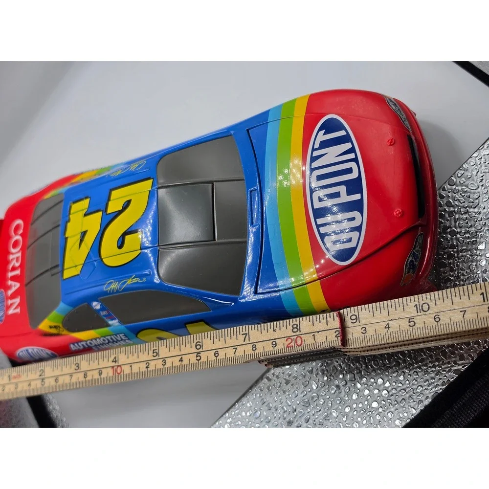 Jeff Gordon 24 DuPont Rainbow Warrior NASCAR Stock Car Toy Stamper Spare Tire